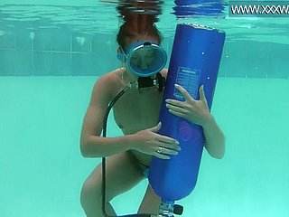 Hungarian beauty fucks a dildo undersea